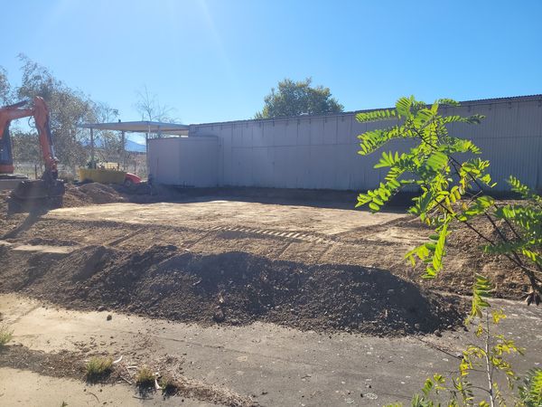 Digging out subgrade for new water tanks after concrete removal at Brancott Estate