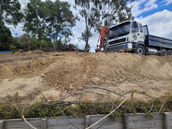 Excavator clearing demolished material from Blenheim site