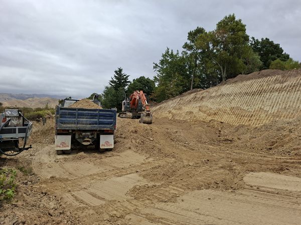 Cut and fill earthworks nearing completion on steep site