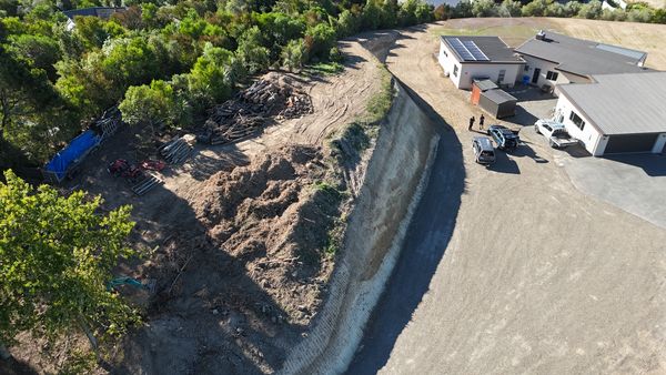 Drone shot showing the cut bank and 1,000m² platform carved into the Morven Lane Blenheim hilltop